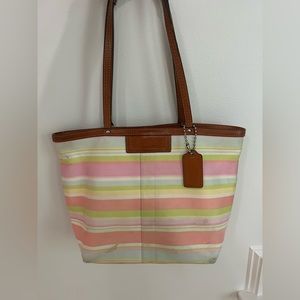 Multicolored COACH purse.